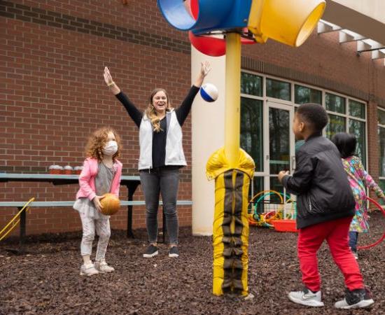 Teacher playing with students